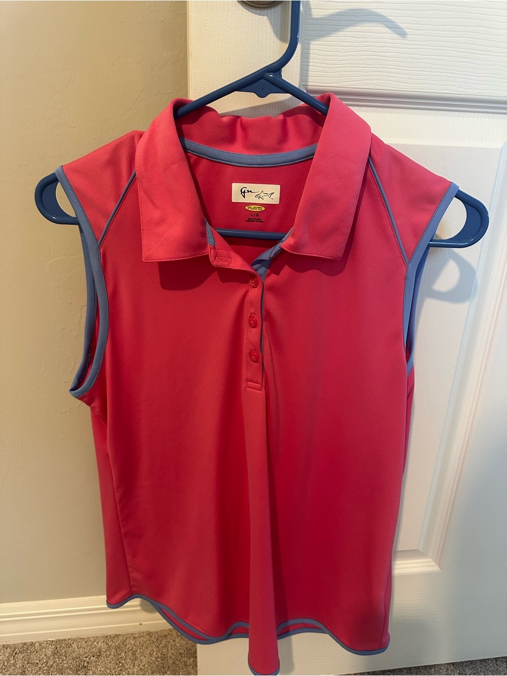 Greg Norman Collection Sleeveless Polo in Coral with Blue Trim